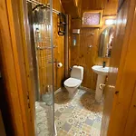 Quarto em Acomodações Particulares Wooden Attic